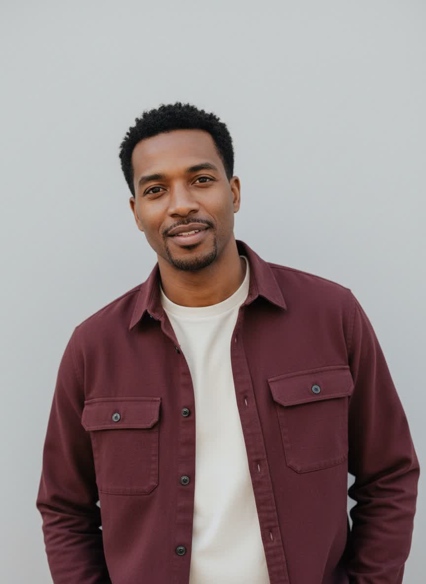 Original man portrait in a burgundy overshirt